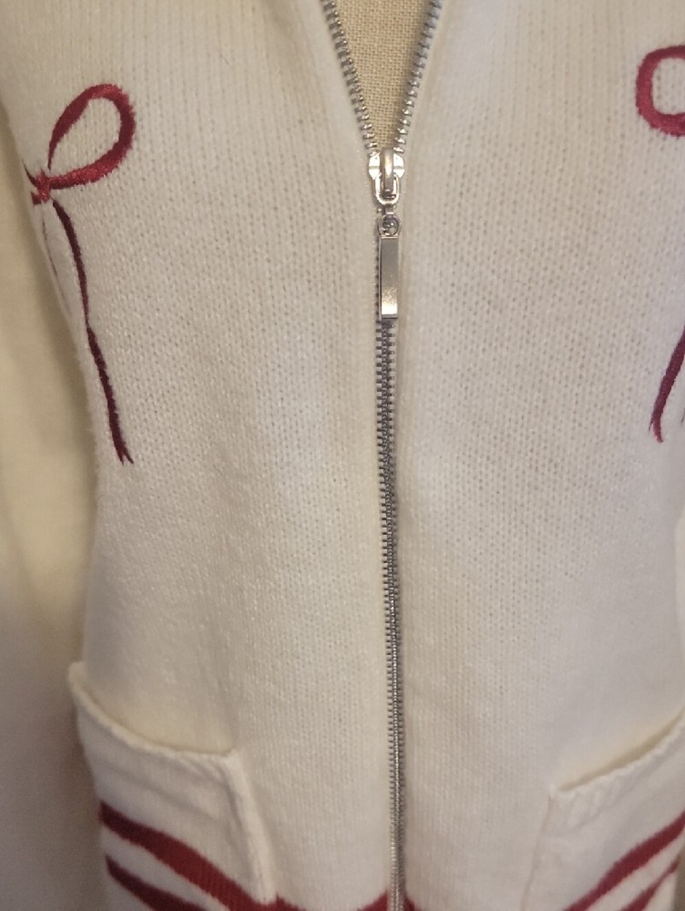 Daisy White Zip-Up Knit Bomber with Pink Bow Details - Picture 4 of 7